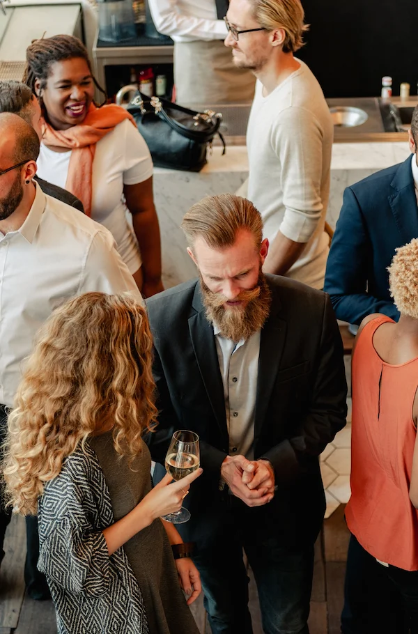 A diverse group of people at a corporate party