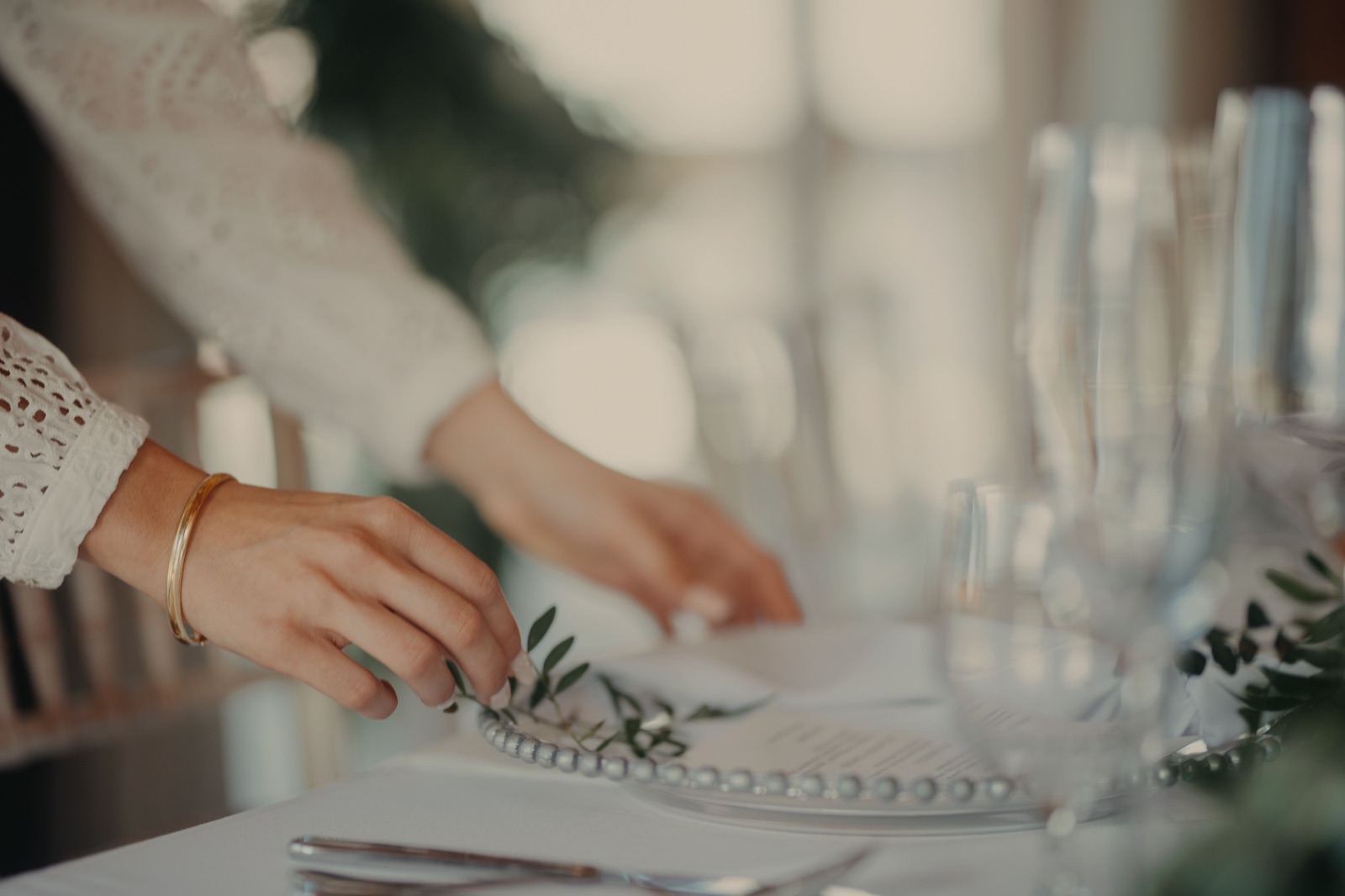 Wedding table setting with candles and place settings