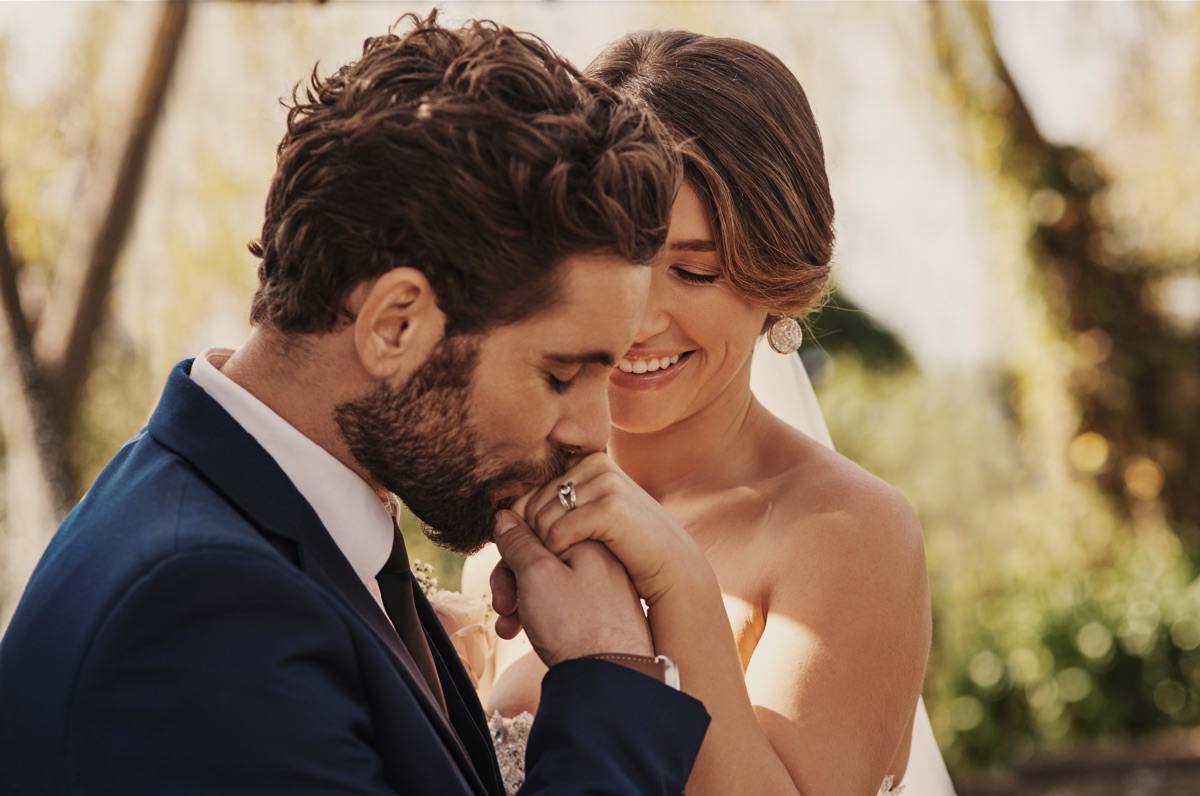 Bride and groom sharing a close, affectionate moment